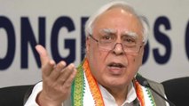 Congress workers protested outside Kapil Sibal's house