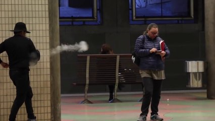 Magician Pranks people with Smoke Rings