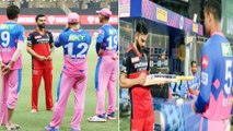 Virat Kohli Passes Tips To RR Youngsters After RCB Win, Gesture Wins Twitterverse  | Oneindia Telugu