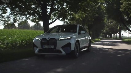 The first-ever BMW iX in White Driving Video