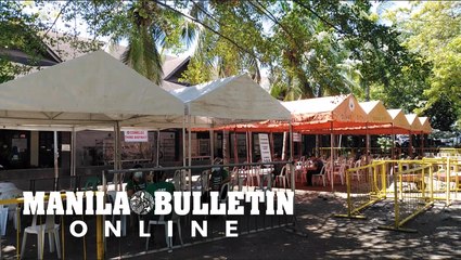 Steel barriers surround the premises of Comelec office inside the Magsaysay Park in Davao City