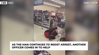Instant Justice Man Breaks Display Case Right In Front Of An Officer.