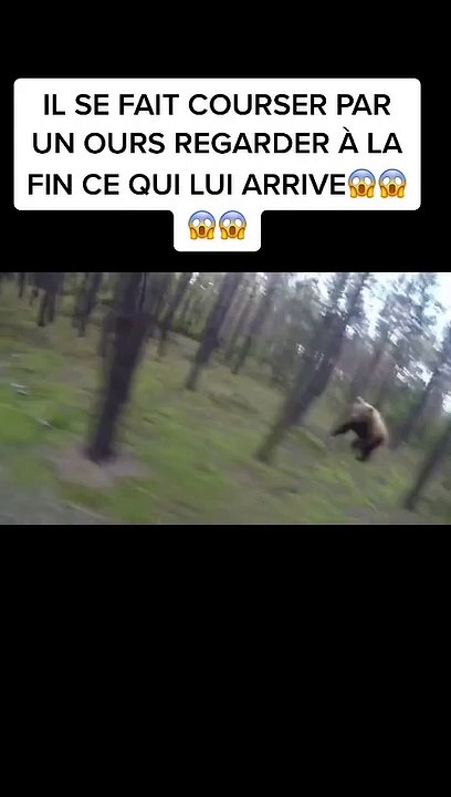 Un vététiste courser par un ours
