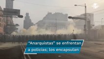 Encapsulan a grupo de encapuchados tras agresiones a policías en marcha por el 2 de octubre