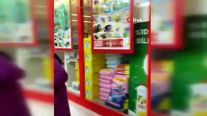 Markete kilitlenen hırsız camı kırarak böyle kaçtı