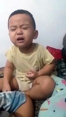 MENANGIS SAMBIL TERTAWA
