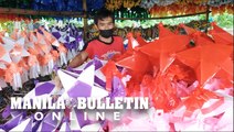 Lantern makers in Davao City continue to assemble the traditional parol amid sales drop