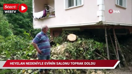 Heyelan nedeniyle evinin salonu toprakla doldu