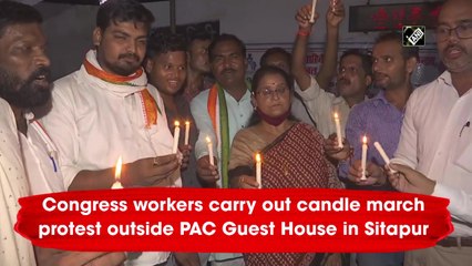 Congress workers carry out candle march protest outside PAC Guest House in Sitapur
