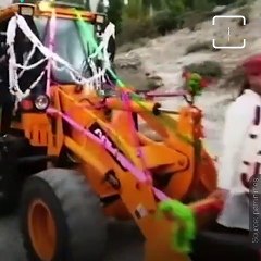 Pakistan’s Newly Wed Couple Use A JCB For Their Wedding Procession
