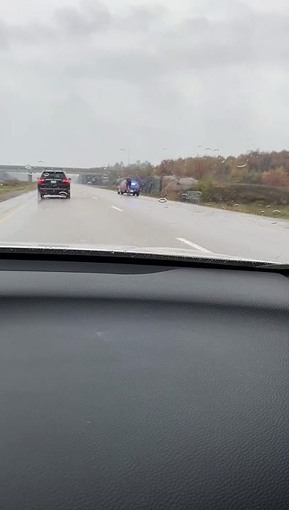 Police Escort Moose Down Highway