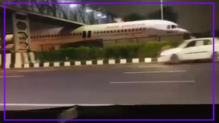 Scrapped Boeing plane gets stuck under bridge on motorway