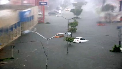 Abandoned cars stranded in floodwaters
