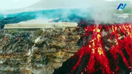 La Palma volcano: Drone video shows "lava lakes" flowing as earthquakes rattle island