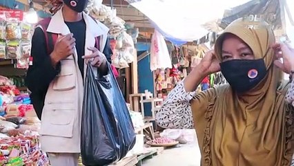 BNPB Bagikan Masker di Pasar Baru Sentani, Kabupaten Jayapura, Papua