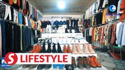 Xinjiang, My Home: Mother of three model for her own clothing store