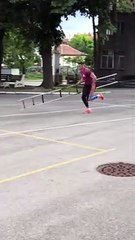 Man Deftly Ascends Building With Ladder
