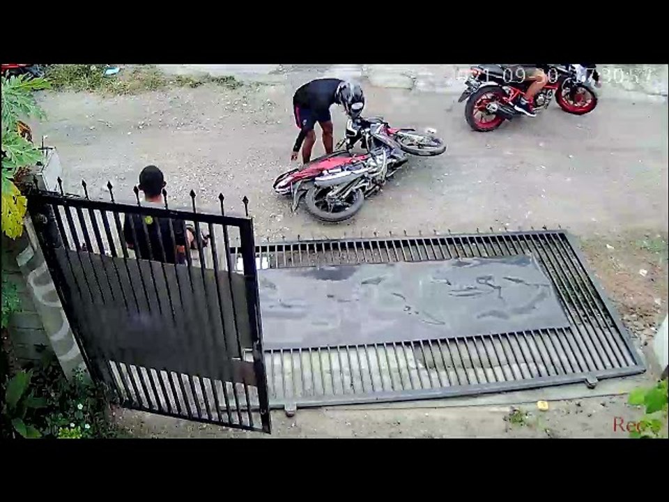 Gate Comes Crashing Down Onto Motorcycle