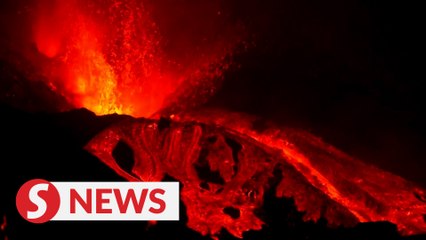 Red hot lava spurts from La Palma volcano