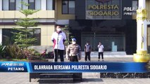 Sembari Olahraga, Kapolres Sidoarjo Salurkan Bansos ke Warga