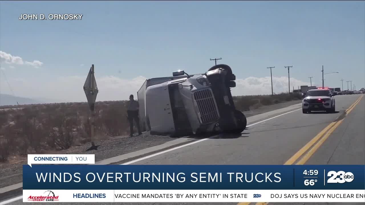 High winds cause damage, road closures througho...