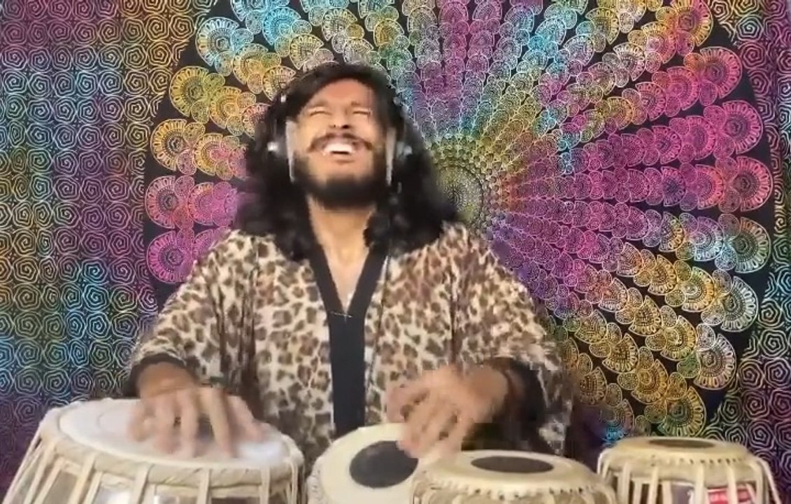 Musician Enjoys Thoroughly While Playing Indian Classical Music on Set