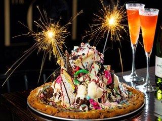 BEHEMOTH PIZOOKIE! Cookie Monster earns its name at The Lola - ABC15 Digital
