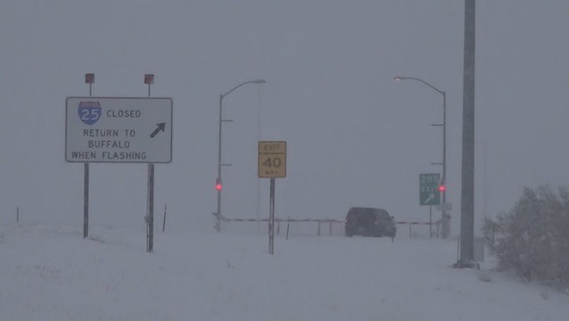 Major snowstorm brings wildfire relief, creates travel headaches