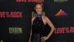 Sarah Flannery attends the "Love on the Rock" Red Carpet Premiere in Los Angeles