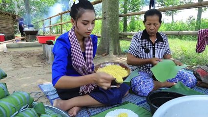 Cooking traditional Sticky rice cake with pork in Cambodia