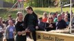 Bumpy road - Couples run through 278-yard obstacle course in wife-carrying championship