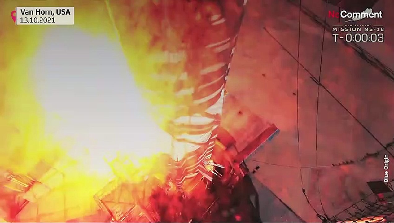 Spectators watch William Shatner launch into space