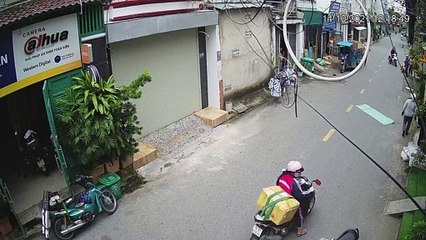 Motorcyclist Nearly Hit by Falling Piece of Roof