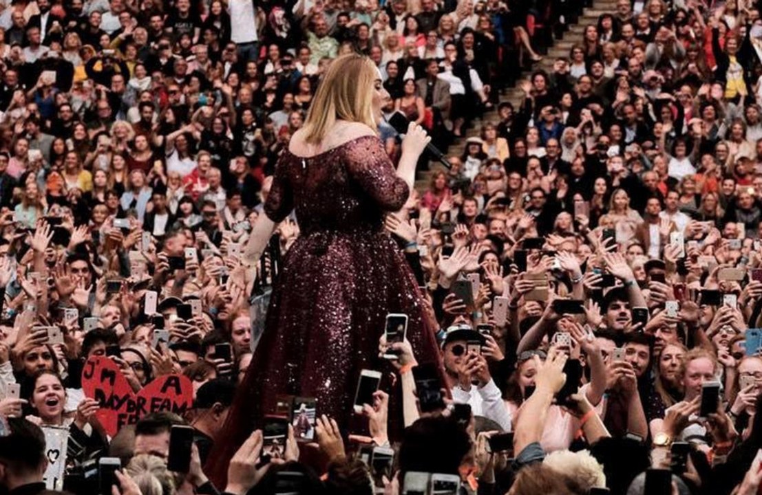 What does Adele's son think about her fame?