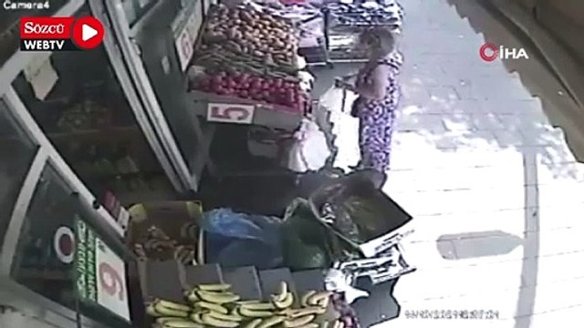 Aracın çarptığı kadın hiçbir şey olmamış gibi alışverişe devam etti