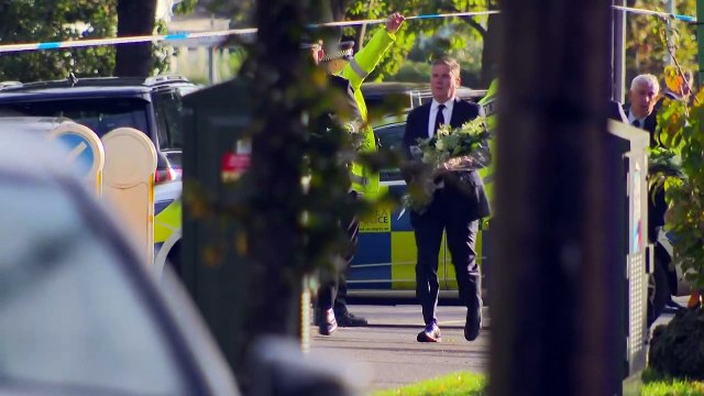 Boris Johnson and Keir Starmer lay flowers for David Amess