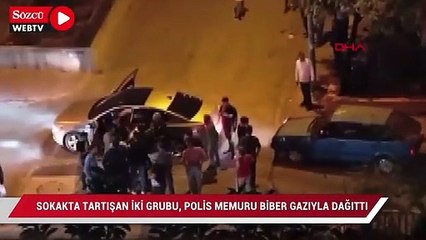 Download Video: Sokakta tartışan iki grubu, polis memuru biber gazıyla dağıttı