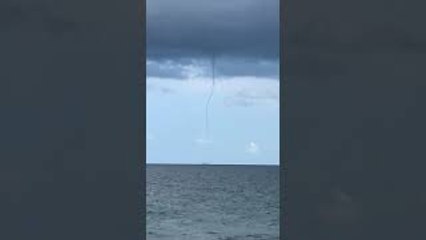 Clouds Make Contact With Ocean