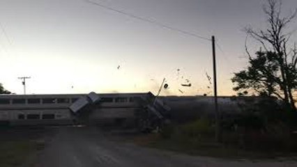 Train Plows Through Car Carrying Semi