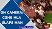 Punjab Congress MLA Joginder Pal slaps man who questions him in Pathankot | Watch | Oneindia News