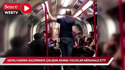 Metroda Asyalı kadına saldırmaya çalışan adama yolcular müdahale etti
