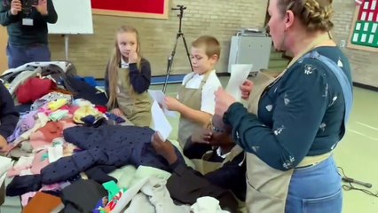 Sheffield schoolchildren pack winter clothing bundles for Afghan refugee children