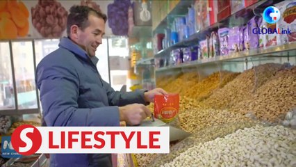 Xinjiang, My Home: Dried fruit vendor
