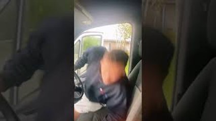Man Exits Van and Slips