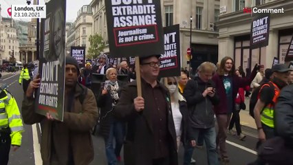 Supporters of WikiLeaks founder Julian Assange march to London's High Court