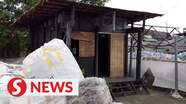Philippine recyclers turn plastic into shelters