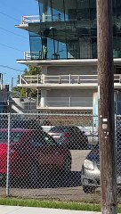 Construction Workers Break Large Glass Window