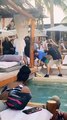 Guy Missteps and Smacks Face on Cabana Pole