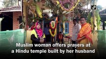 Muslim woman offers prayers at a Hindu temple built by her husband