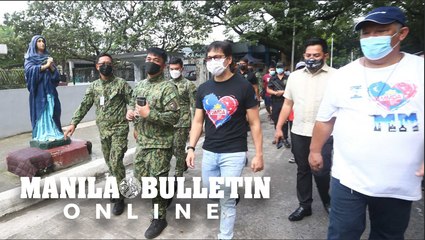 MMDA Chairman Benhur Abalos and PLTCOL. John Guiagui inspect the Manila North Cemetery